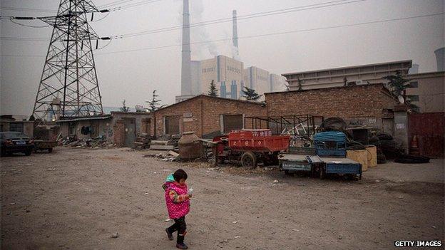 Child near a power station in Beijing, China (Nov 2014)