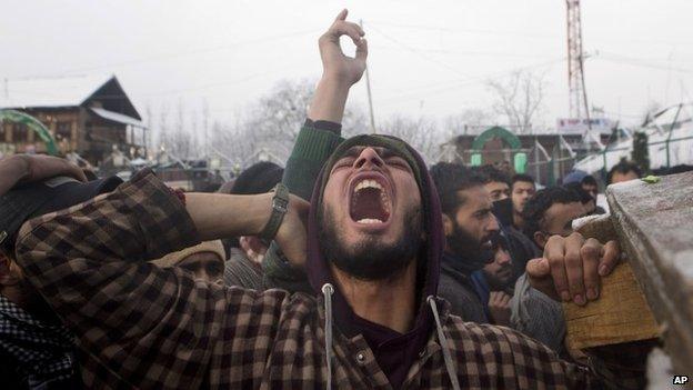 A Kashmiri Muslim villager shouts during the funeral procession of a suspected rebel Kashmir on Feb 26, 2015