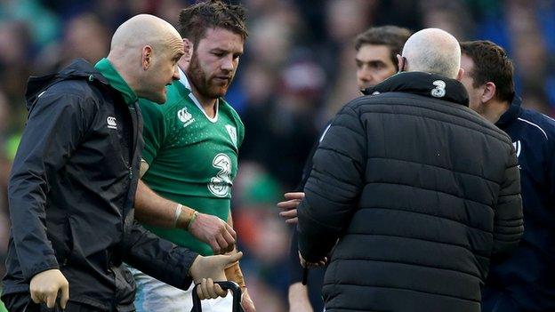 Sean O'Brien on his way off the Aviva Stadium field after suffering concussion