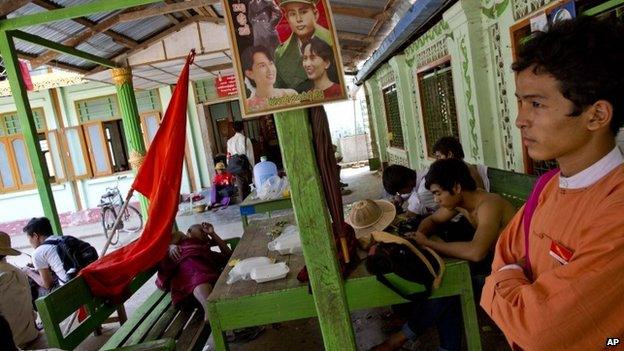 Student protesters rest in a monastery after police surrounded the monastery preventing them from proceeding with a protest march to Yangon from Letpadan, north of Yangon, Myanmar, Monday, March 2, 2015.