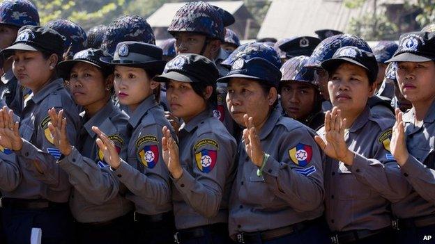 Female officers of Myanmar police prepare to defend a human-chain they formed to stop student protesters in Letpadan, Myanmar on 3 March 2015