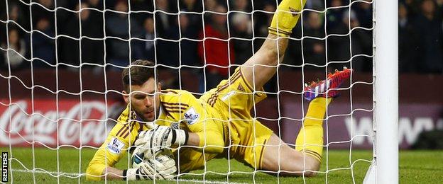 Ben Foster stops Gabriel Agbonlahor's shot on the line