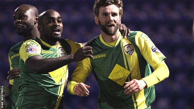 Paddy McCourt (r) celebrates his winner for Notts County