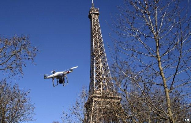Illustration of drone beside Eiffel Tower (27 Feb)