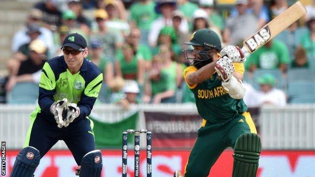 Ireland wicket-keeper Gary Wilson sees Hashim Amla hit another boundary in Canberra on Tuesday