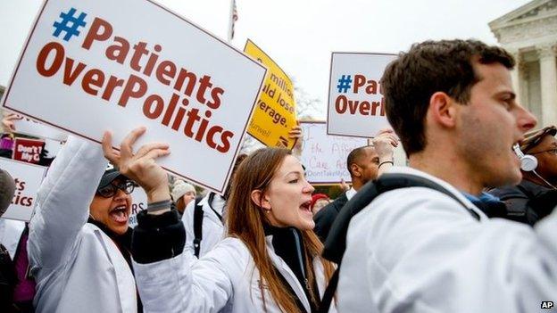 University of Maryland medical student Sarah Britz, centre, and others, rally outside the Supreme Court in Washington 4 March 2015