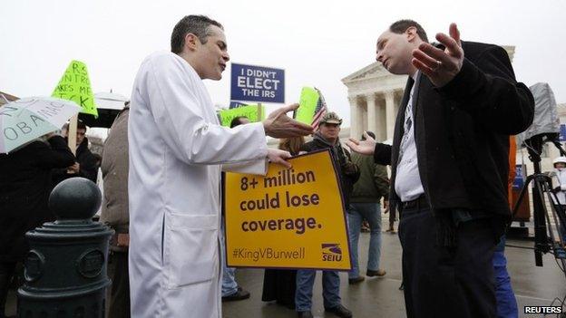 Devon Fagel (L), a physician and cancer survivor, argues in favour of Obamacare with Phil Kerpen (R), who was part of a Tea Party Patriots demonstration against the health care law, in front of the Supreme Court building in Washington 4 March 2015