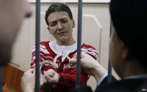 Nadia Savchenko is handcuffed at the end of court hearing at the Basmanny District Court in Moscow, Russia, 4 March 2015