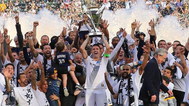 Robbie Keane lifts the MLS Cup