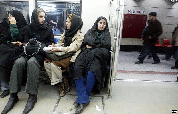 Women sitting on metro