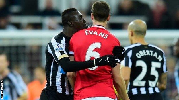 Papiss Cisse spits at Jonny Evans