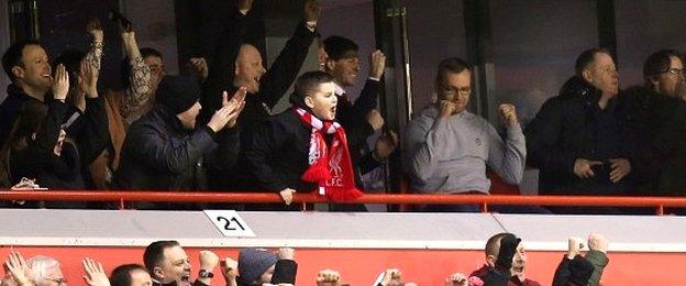 Steven Gerrard (centre) celebrates Jordan Henderson's opener