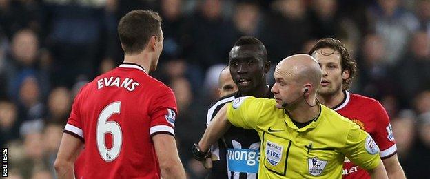 Jonny Evans and Papiss Cisse