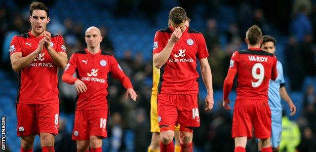 Leicester City players react after their 2-0 defeat at Manchester City