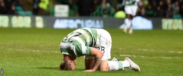 Leigh Griffiths is dejected after passing up an opportunity to level for Celtic.