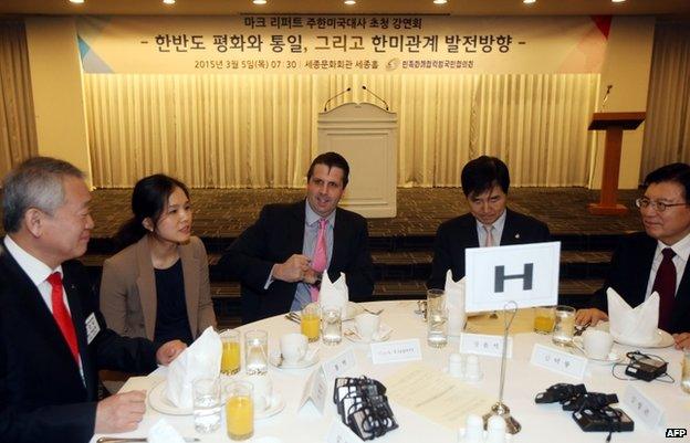 Mark Lippert at the table just before the attack in Seoul, 5 March