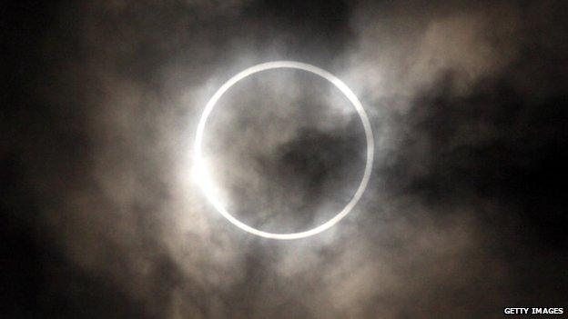 he sun is obscured by the moon during an annular solar eclipse in Tokyo, Japan, on Monday, May 21, 2012