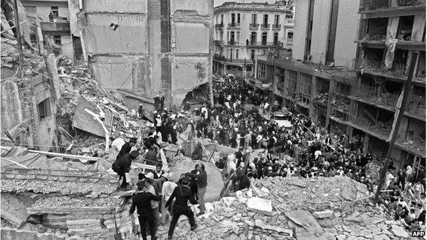 Police and rescuers in the wreckage of the Amia building in Buenos Airea, July 1994