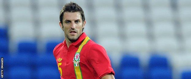 Sam Ricketts in action for Wales