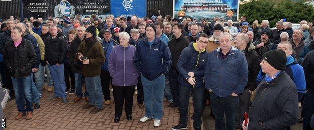 Rangers fans gather outside Ibrox