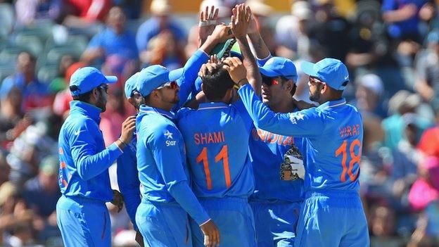 India celebrate a wicket