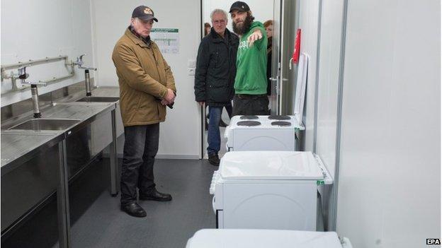 People look at kitchen at Koepenick