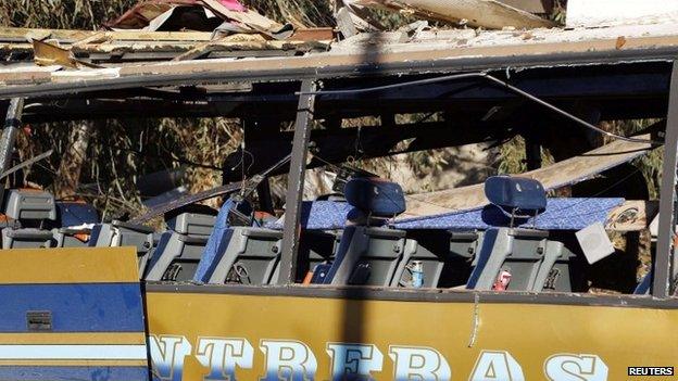 The wreckage of a bus believed to be carrying Lebanese Shia Muslim pilgrims in Damascus which the Nusra Front claimed responsibility for bombing (01 February 2015)