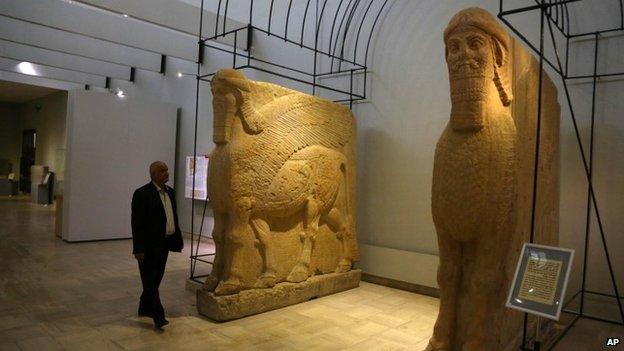 Two ancient Assyrian winged bull statues at Iraq's National Museum in Baghdad