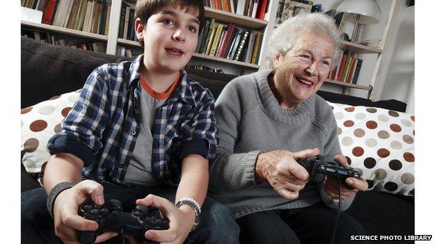 Kids playing a game with his relative