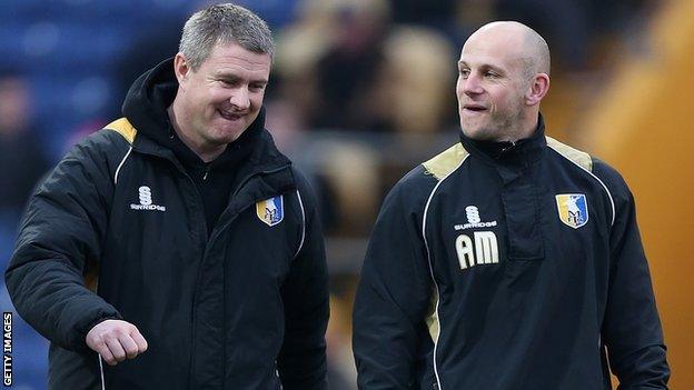 Mansfield manager Adam Murray (right) and assistant boss Micky Moore