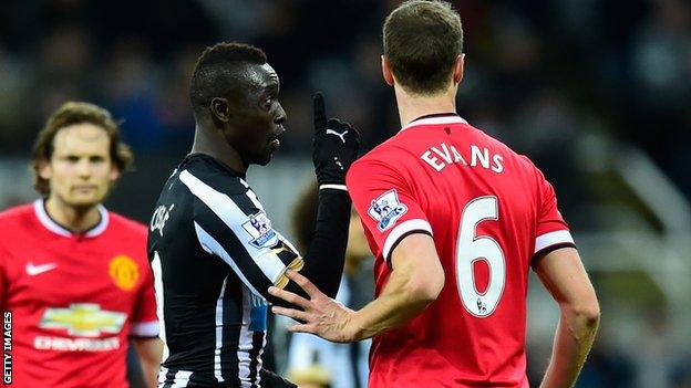 Papiss Cisse and Jonny Evans