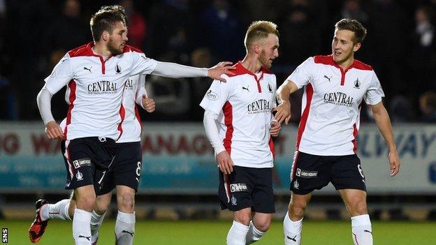 Falkirk's Craig Sibbald (centre) celebrates with his team-mates having opened the scoring.