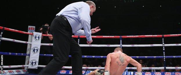 Referee giving Paul Butler a count