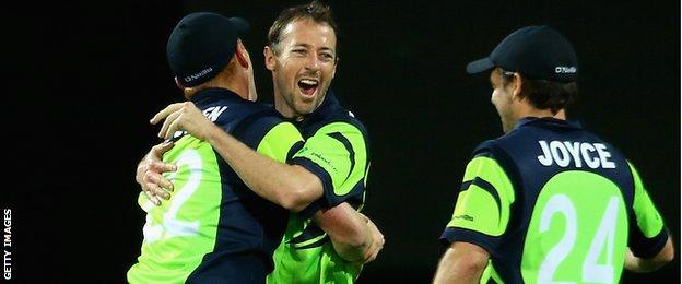 Alex Cusack celebrates his double wicket haul in the final over