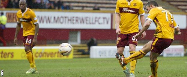 Scott McDonald curls in the leveller for Motherwell