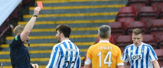 Kilmarnock's Darryl Westlake is sent off just before half-time for a second yellow card offence