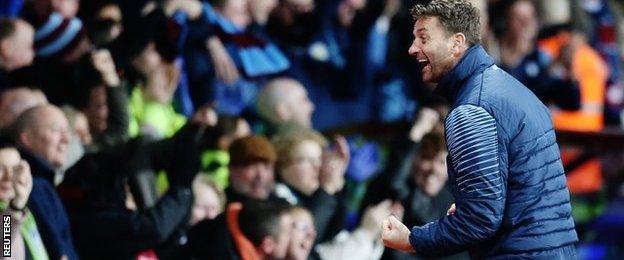 Aston Villa manager Tim Sherwood celebrates with fans