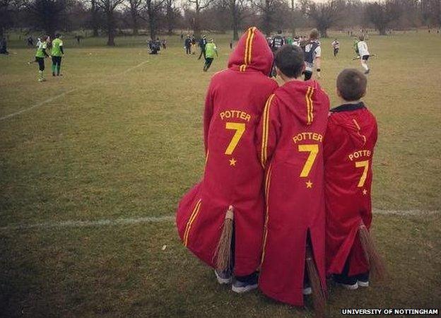 Harry Potter fans watch the quidditch players at Wollaton Park