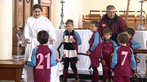 Young football fans at Derby Cathedral