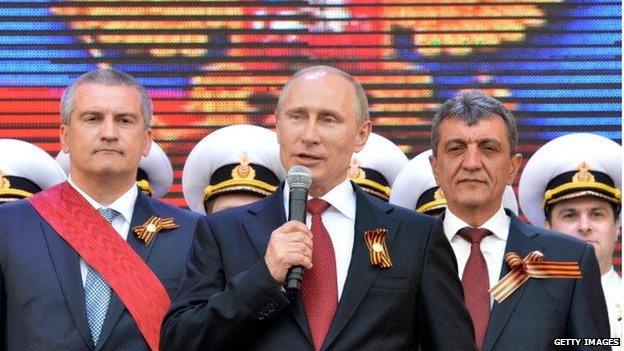 Russian President Vladimir Putin speaks during his visit to the Crimean port of Sevastopol on 9 May 2014