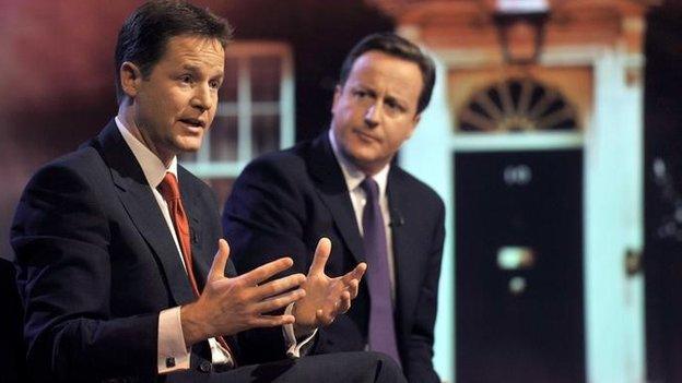 David Cameron and Nick Clegg give an interview after the coalition government's first Budget in June 2010