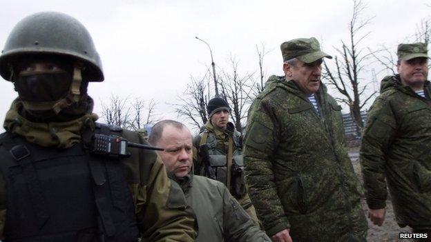 Russian Lieutenant General Alexander Lentsov arrives to visit the airport in Donetsk