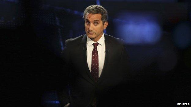 Egyptian comedian Bassem Youssef shrugging