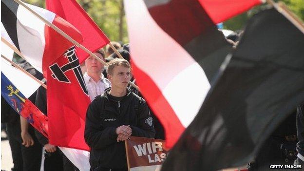 Supporters of the far-right NPD political party prepare to march on 1 May, 2014