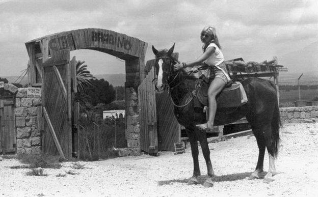 Rina on horseback 1960s