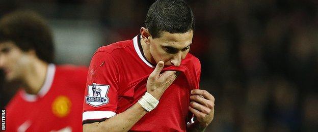 Angel Di Maria walks off following his sending off