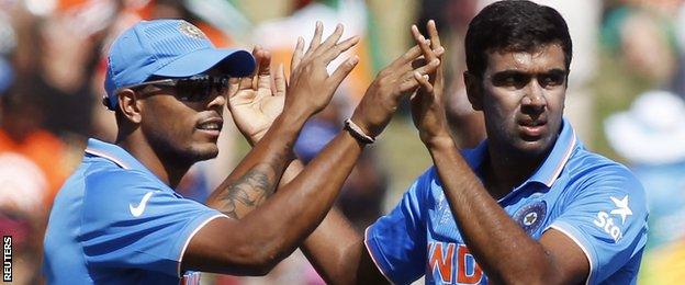 India's Ravichandran Ashwin (right) celebrates with teammate Umesh Yadav