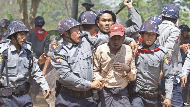 Police arrest a student protester at the protest site in Letpadan, Bago division, Myanmar, 10 March 2015.