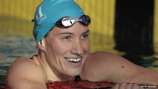 French swimmer Camille Muffat reacts after winning the women's 200m freestyle final heat of the French swimming championships in Chartres. 12 April 2014