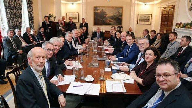 Politicians pictured after Stormont House Agreement was reached